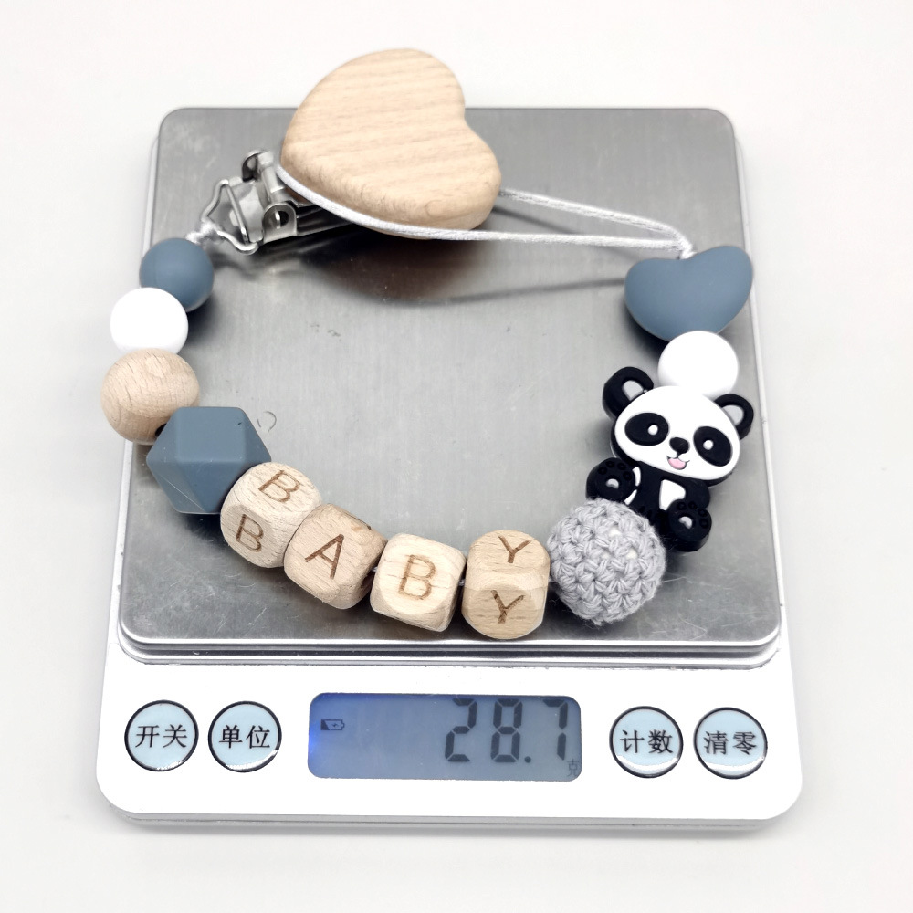 Drewniany, personalizowany łań – Baby Food Teether recenzja i cena
